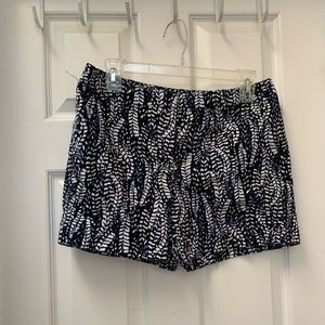 White House Black Market woman’s size 6 navy blue and white shorts.